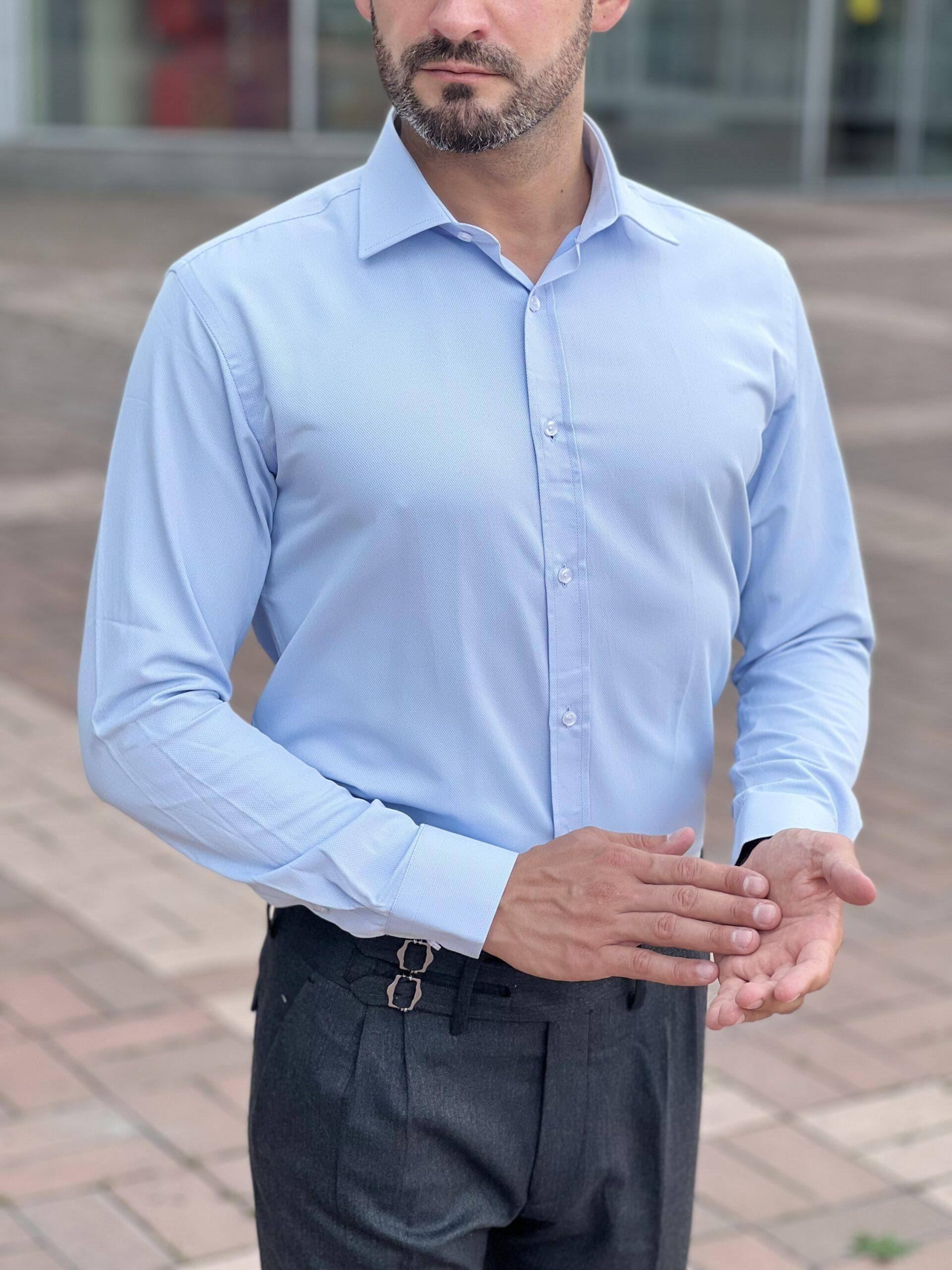 A light blue mens shirt is the perfect choice for a stylish look.